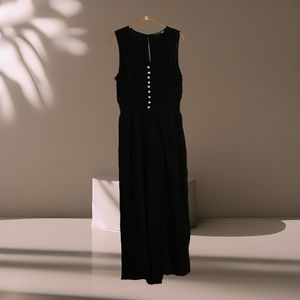 Black Tape Sleeveless Jumpsuit